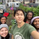 Group selfie of volunteers in garden